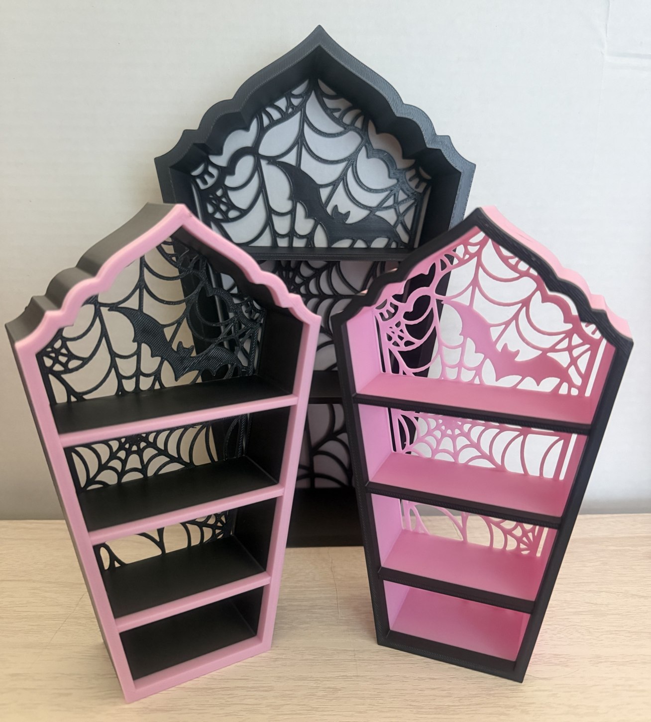 Black and pink spiderweb coffin miniature bookshelves